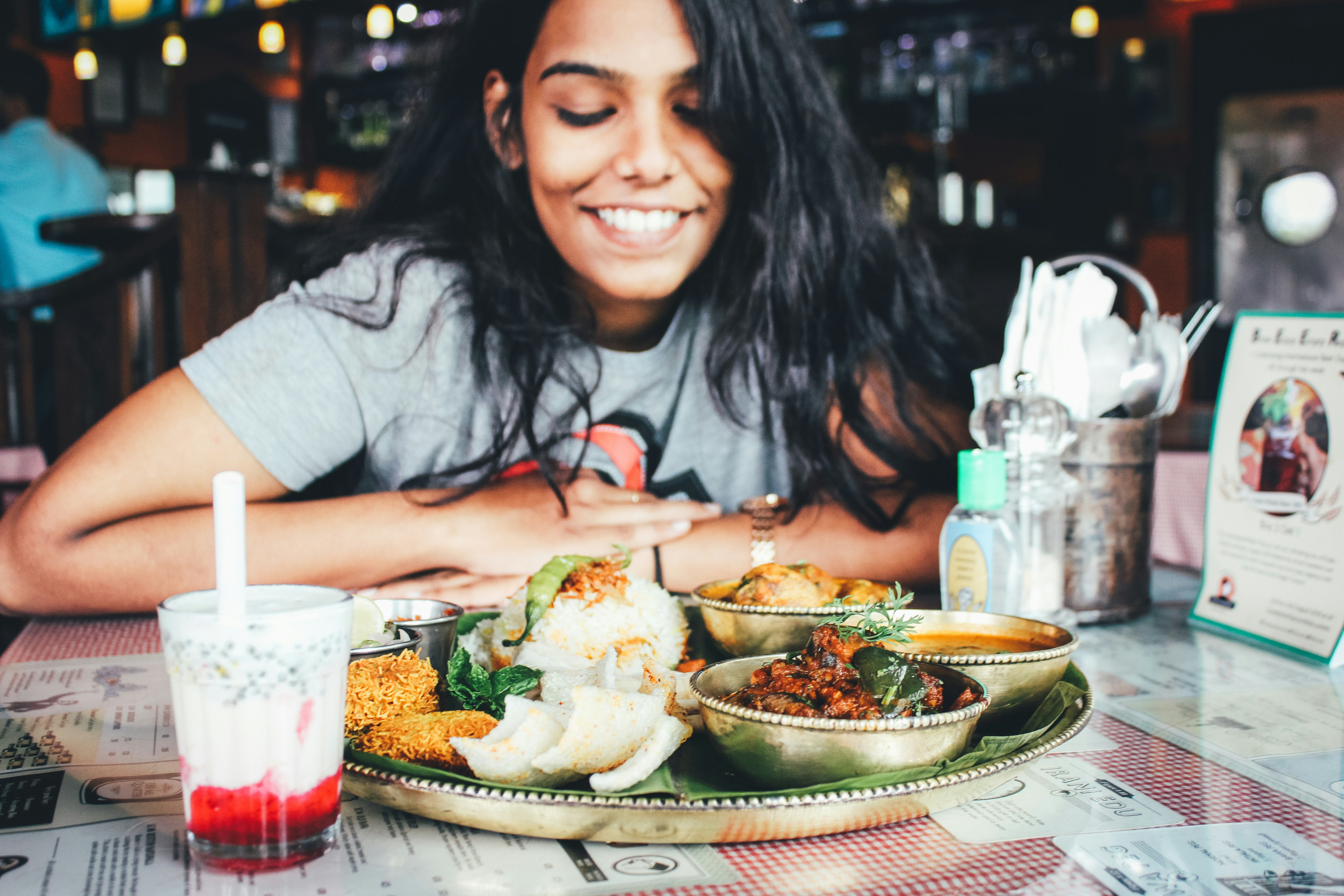 Foodie smiling at her meal